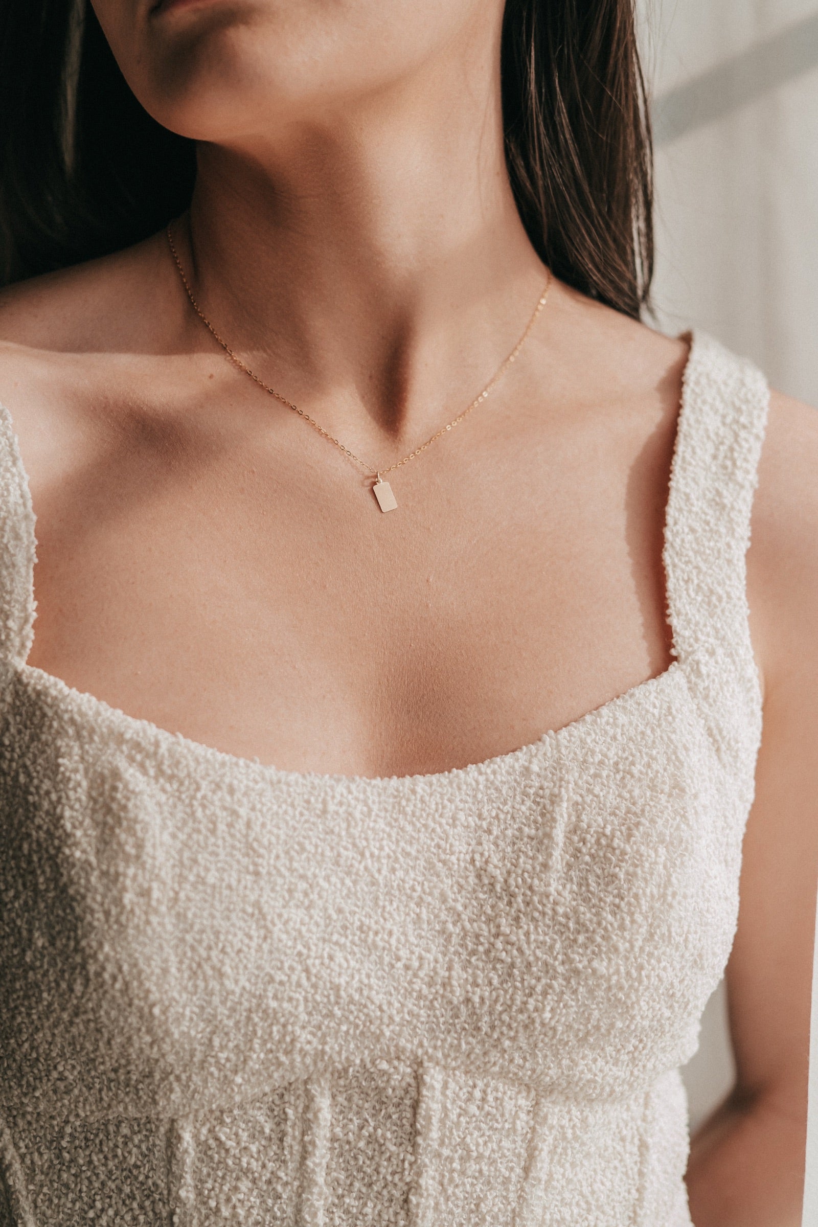 Layered gold necklaces
